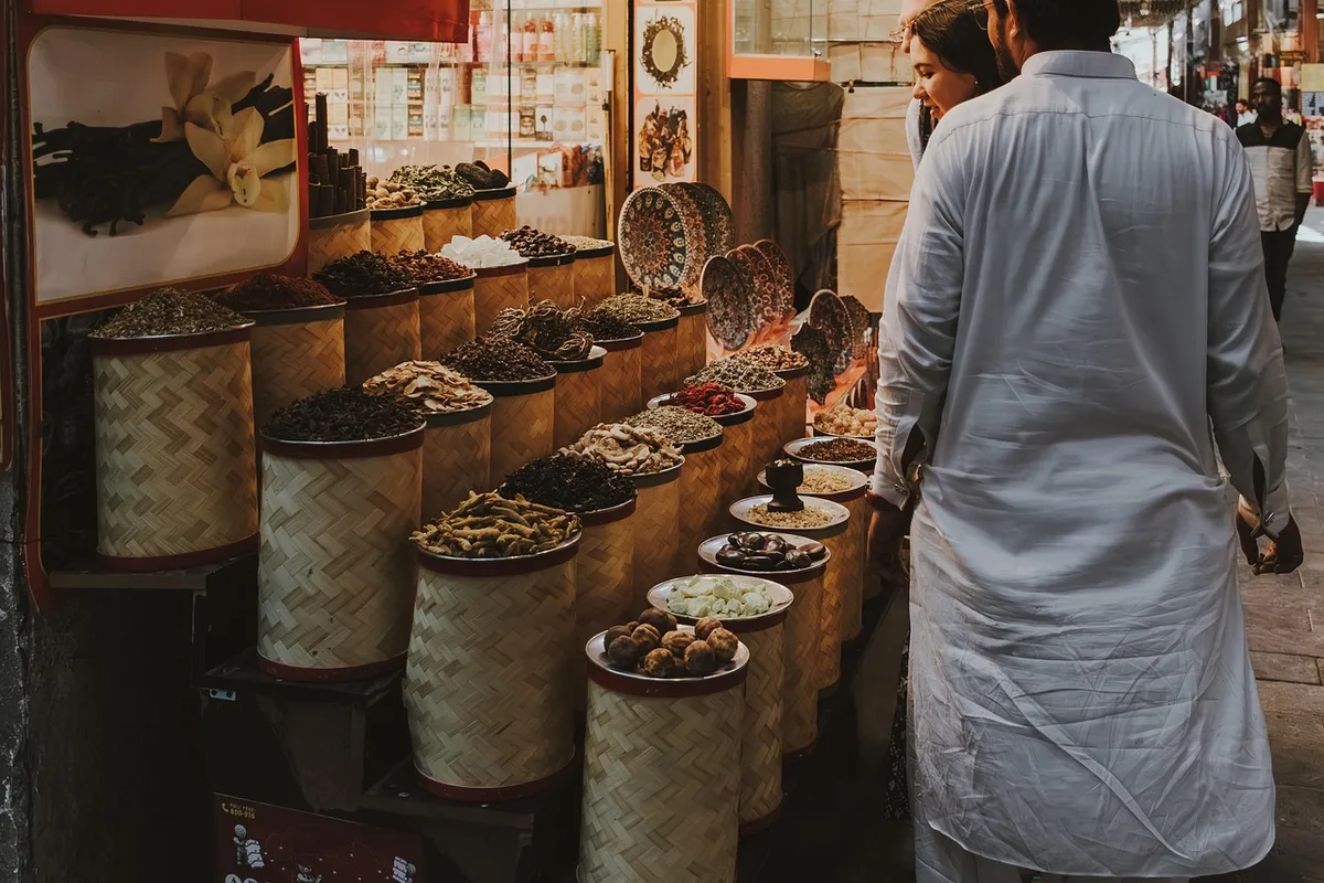 spice market, dubai souq, traditional market, spice stall, middle eastern spices, local shopping, dubai, souq shopping, herbs, aromatic spices, shopping in duba